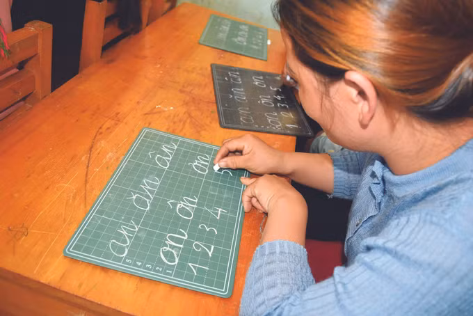 ខេត្ត ដាក់ណុង លុបបំបាត់អនក្ខរកម្មក្នុងចំណោមបងប្អូនជនជាតិភាគតិច ảnh 2