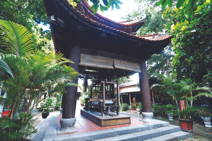 កីបុរាណត្រូវបានដាក់បង្ហាញនៅមុខទីសក្ការៈបូជាគ្រូបង្កើតរបរ វ៉ានភុក - ភូមិសិប្បកម្មតម្បាញសូត្រមានអាយុកាលរាប់ពាន់ឆ្នាំ ảnh 1
