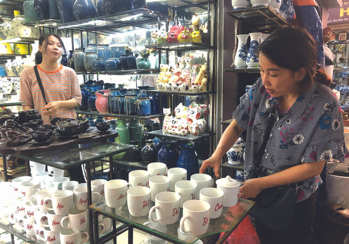 លក្ខណៈថ្មីនៅភូមិកុលាលភាជន៍មួយនៅជាយក្រុង ảnh 2