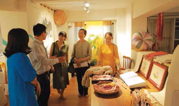 អ្នកអភិរក្សនិងអភិវឌ្ឍសំពត់សូត្រ វៀតណាម ảnh 3