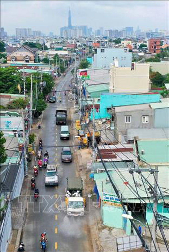 ចាប់ផ្តើមបាញ់សារធាតុគីមីសម្លាប់មេរោគ លាងសម្អាតជាតិពុលលើភូមិសាស្ត្រទីក្រុង ហូជីមិញ ទាំងមូល ảnh 1