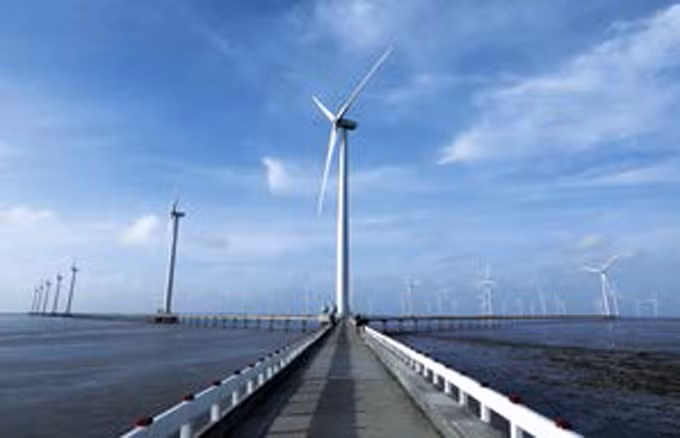 ថាមពលអគ្គិសនីដើរដោយខ្យល់ប្រភពថាមពលស្អាតចូលរួមចំណែកក្នុងកិច្ចការការពារបរិស្ថាន ảnh 3