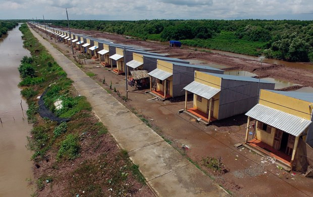 គម្រោងតំបន់លំនៅដ្ឋាន ត្រាសេត ស្ថិតក្នុងសង្កាត់ វិញហាយ ទីរួមខេត្ត វិញចូវ (ខេត្ត សុកត្រាំង) ក្នុងគោលបំណងឧបត្ថម្ភដីលំនៅដ្ឋាន ដីផលិតកម្ម និងលំនៅដ្ឋានជូនក្រុមគ្រួសារក្រីក្រស្ថិរភាពជីវភាពរស់នៅ ។ រូបថត៖ អានហៀវ ប្រសិទ្ធភាពនៃកម្មវិធីគោលដៅជាតិកាត់បន្ថយភាពក្រីក្រប្រកបដោយចីរភាពនៅខេត្ត សុកត្រាំង ảnh 4