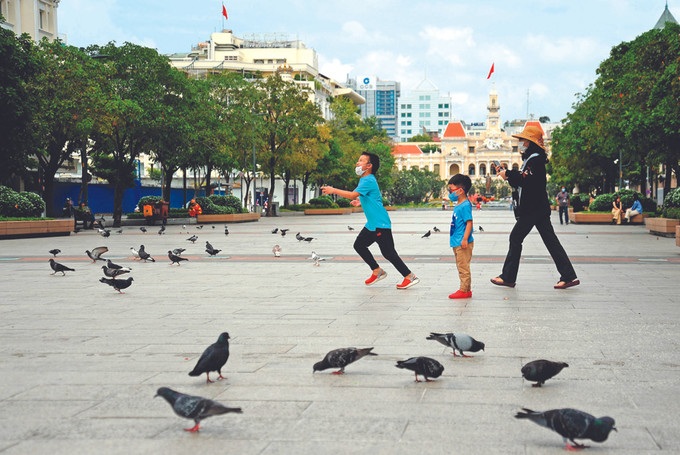 ទីក្រុង ហូ ជីមិញ ជាមួយនឹងចង្វាក់ជីវិតរស់នៅតាមគន្លងប្រក្រតីភាពថ្មី ảnh 1