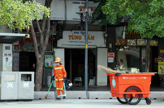 ទីក្រុង ហូជីមិញ ​អនុវត្ត​គម្លាត​​សុវត្ថិភាព​សង្គម​ដើម្បីបង្កើនការងារបង្ការ ទប់ស្កាត់ការរីករាលដាលនៃជំងឺកូវីដ-១៩ ảnh 4