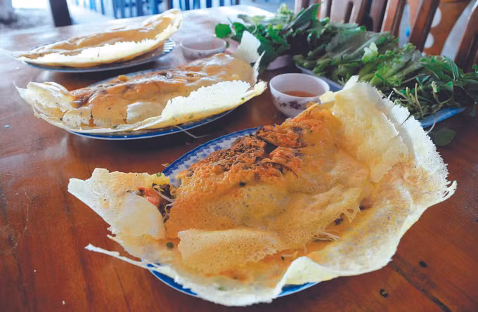 នំចាក់អំបែង យ៉ុងញ៉ាន ដ៏ទាក់ទាញ ảnh 1