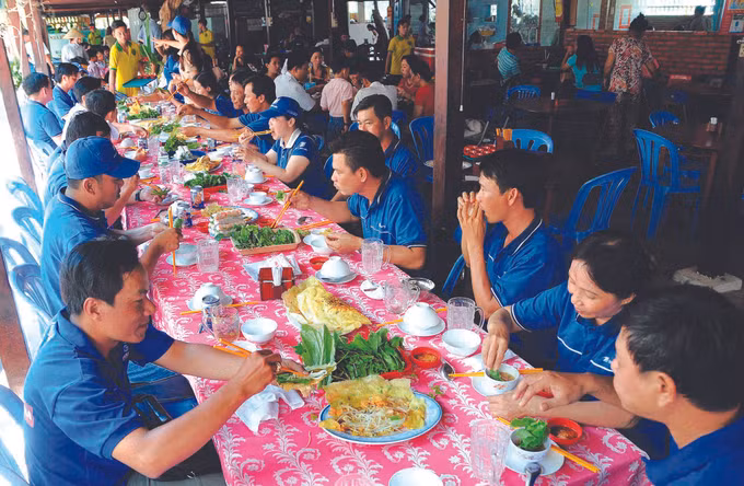 នំចាក់អំបែង យ៉ុងញ៉ាន ដ៏ទាក់ទាញ ảnh 2