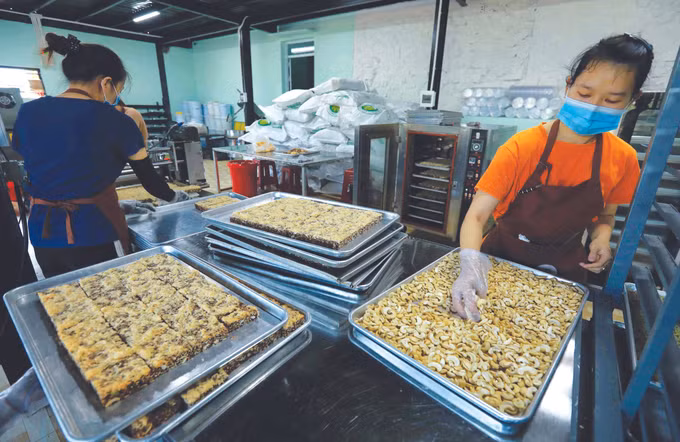 OCOP លើកកម្ពស់កម្រិតតម្លៃកសិផល ដាក់ណុង ảnh 3