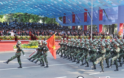 ប្លុកកងកម្លាំងប្រដាប់អាវុធចូលរួមព្យុហយាត្រាយោធារំលឹកអនុស្សាវរីយ៍ខួបគម្រប់ ៤០ ឆ្នាំនៃទិវារំដោះភូមិភាគខាងត្បូង បង្រួបបង្រួមប្រទេសជាតិ។ រូបថត៖ ទីភ្នាក់ងាព័ត៌មាន វៀតណាម ប្លុកកងកម្លាំងប្រដាប់អាវុធចូលរួមព្យុហយាត្រាយោធារំលឹកអនុស្សាវរីយ៍ខួបគម្រប់ ៤០ ឆ្នាំនៃទិវារំដោះភូមិភាគខាងត្បូង បង្រួបបង្រួមប្រទេសជាតិ។ រូបថត៖ ទីភ្នាក់ងាព័ត៌មាន វៀតណាម