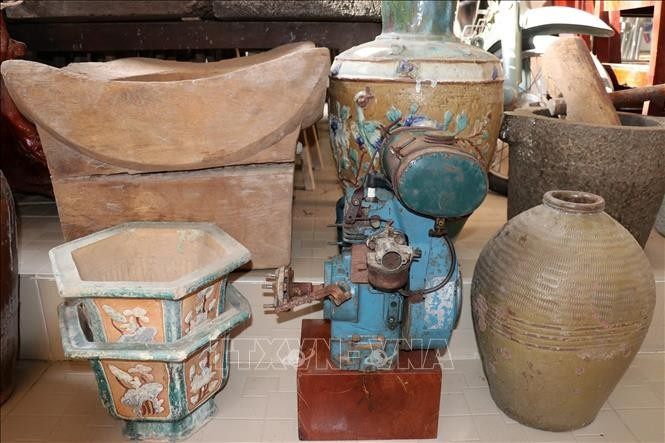 បរិវេណដាក់បង្ហាញឧបករណ៍កសិកម្មដែលលោក ហៀវ ប្រមូលបាន mo-hinh-sx-nong-nghiep-3.jpg